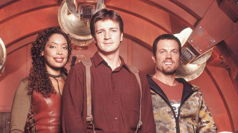 "Firefly" cast members Gina Torres, Nathan Fillion and Adam Baldwin.