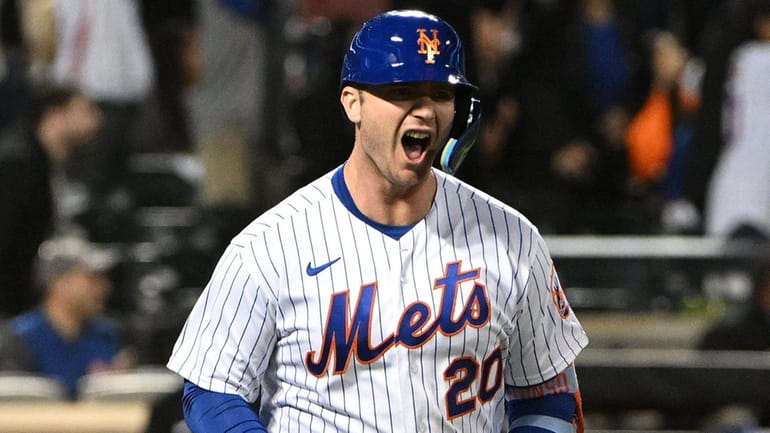 ThenMets' Pete Alonso reacts as he runs on his three-run...