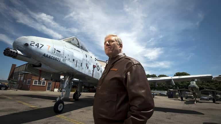 American Airpower Museum president Jeff Clyman standing on front of...