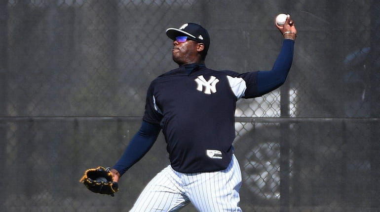 Yankees closer Aroldis Chapman loosens up at spring training at...