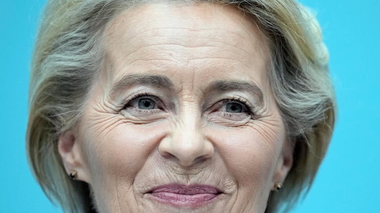 Ursula von der Leyen, President of the European Commission, smiles...