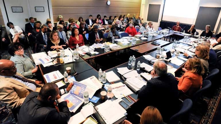 The state Board of Regents discusses regulations during a meeting...