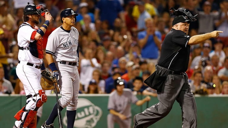 Home plate umpire Brian O'Nora warns both benches after Alex...