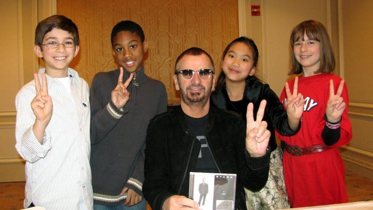 Ringo Starr with Kidsday reporters, from left, Paul DeLibero, Jaedon...