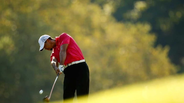 Tiger Woods on the 14th hole during the first round...