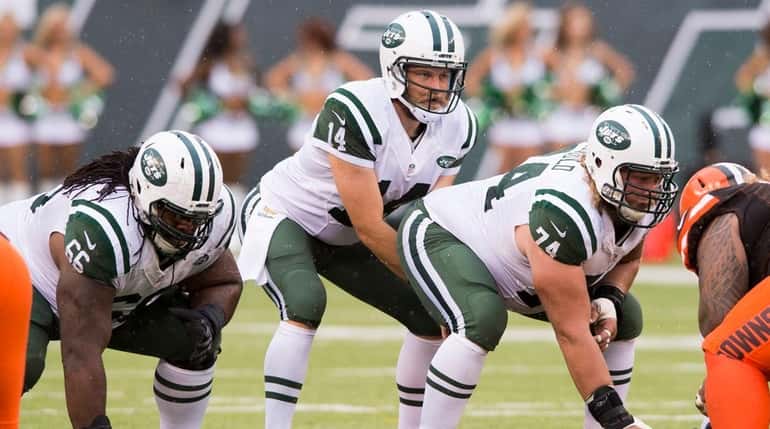 Jets quarterback Ryan Fitzpatrick and center Nick Mangold are close,...