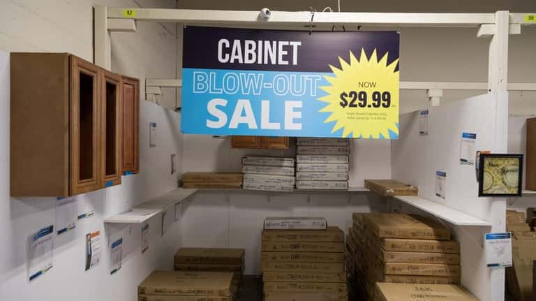 Kitchen cabinets, still in their boxes, for sale at the...