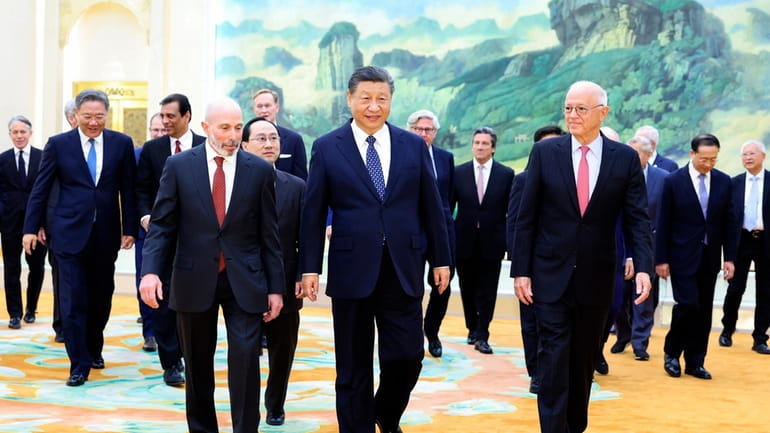 In this photo released by Xinhua News Agency, Chinese President...