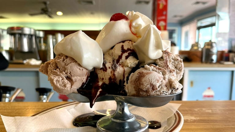 The Four Queens sundae at Sip'N Soda in Southampton comes...