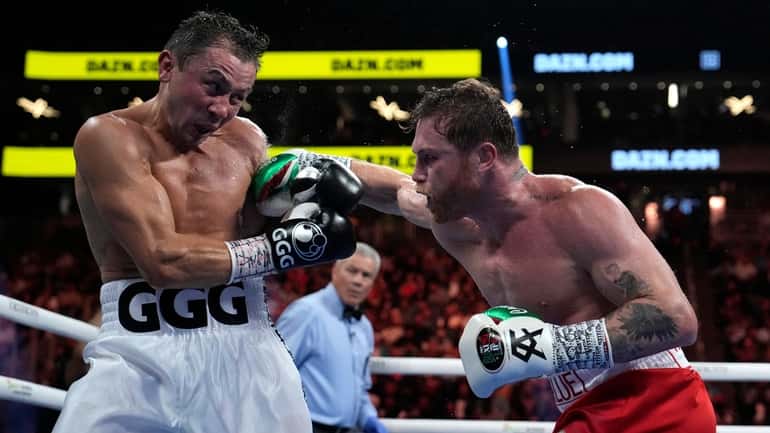 Canelo Alvarez, right, fights Gennady Golovkin in a super middleweight...