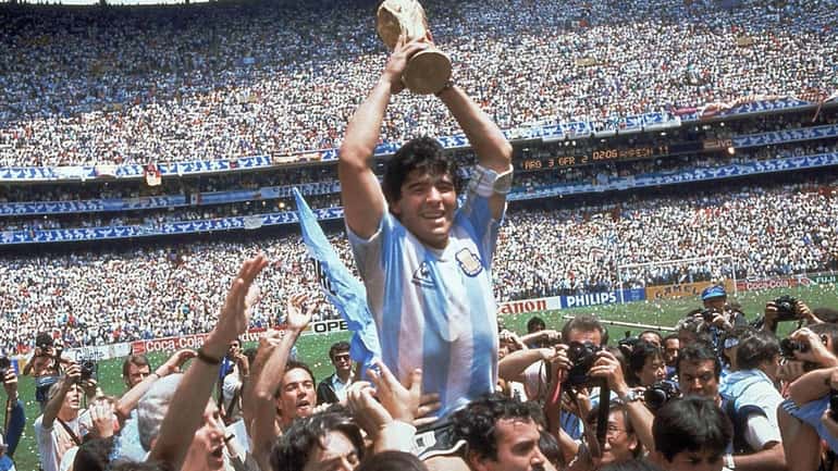 Diego Maradona of Argentina celebrates at the end of the...