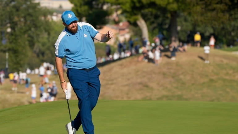 Europe's Shane Lowry reacts on the 6th green during his...
