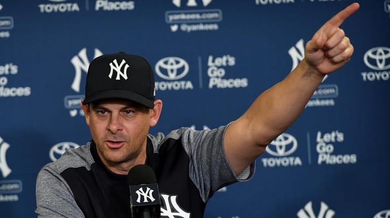 Yankees manager Aaron Boone speaks to media during a press...