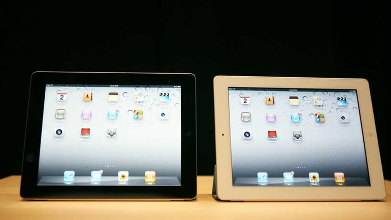 The second generation iPads are displayed during Apple's special media...