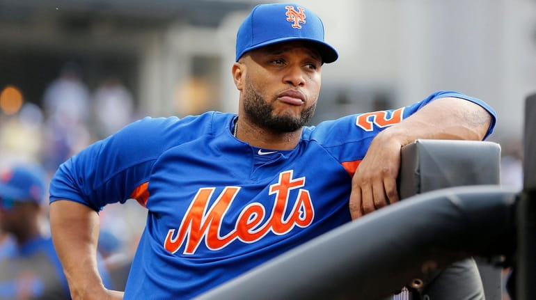 Robinson Cano #24 of the Mets looks on against the...