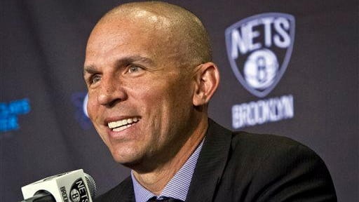 Jason Kidd smiles as he is introduced during as the...
