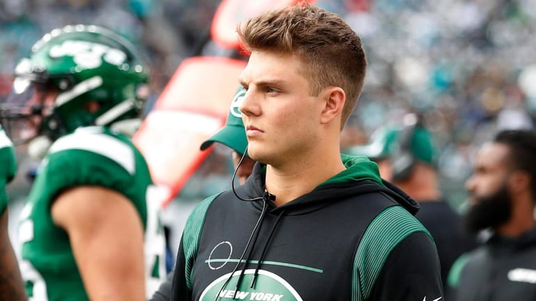 Zach Wilson of the Jets looks on against the Dolphins...