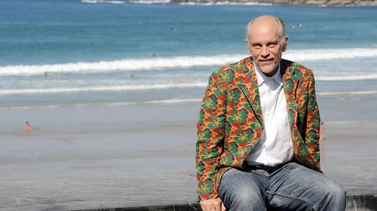 Actor and director John Malkovich attends a "Burn After Reading" photocall during...