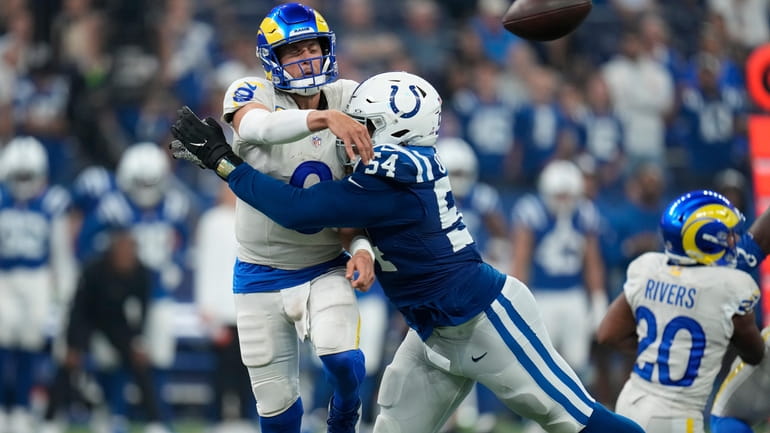 Los Angeles Rams quarterback Matthew Stafford throws the ball as...