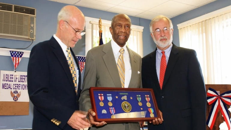 Hugh C. Clarke receives the Jubilee of Liberty Medal, Good...