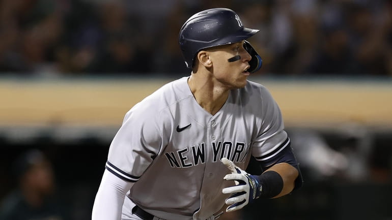 The Yankees' Aaron Judge hits a three-run home run off...
