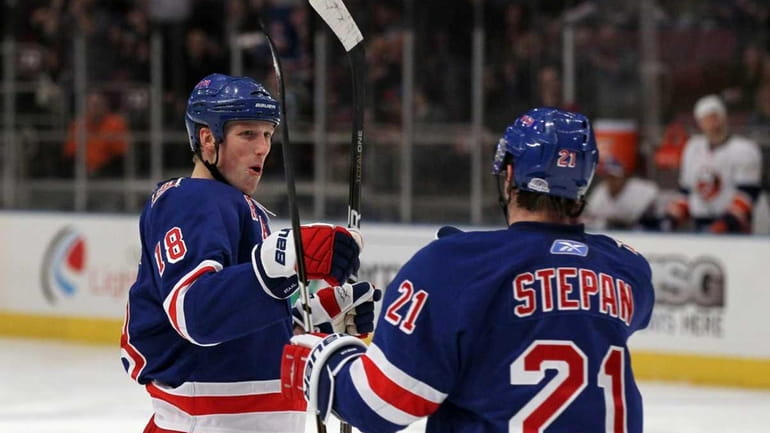 Marc Staal of the New York Rangers celebrates his second...