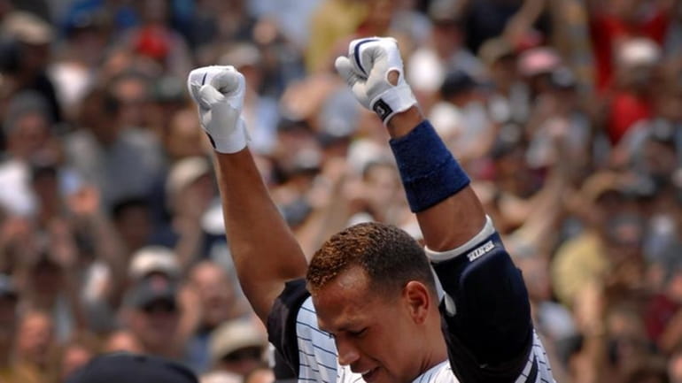 Alex Rodriguez makes a curtain call after hitting his 500th...