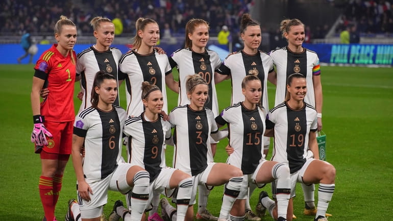 Germany starting players pose for a team photo at the...