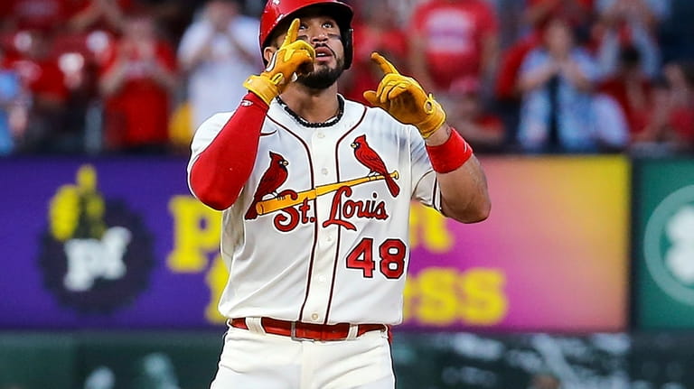 St. Louis Cardinals Ivan Herrera gestures after hitting a two-run...