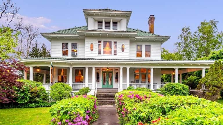 This circa-1913, multifamily Victorian, priced at $1.8 million, has six...