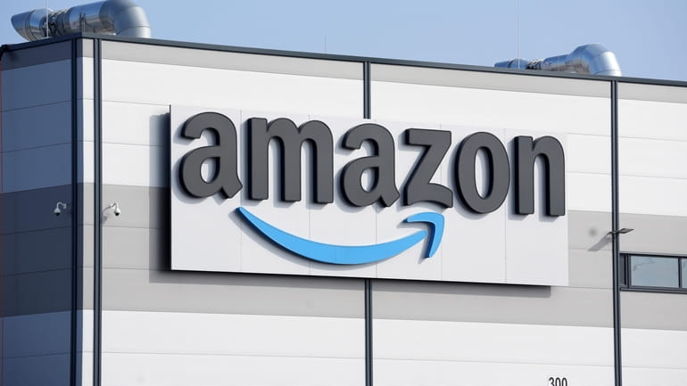 An Amazon company logo marks the facade of a building...