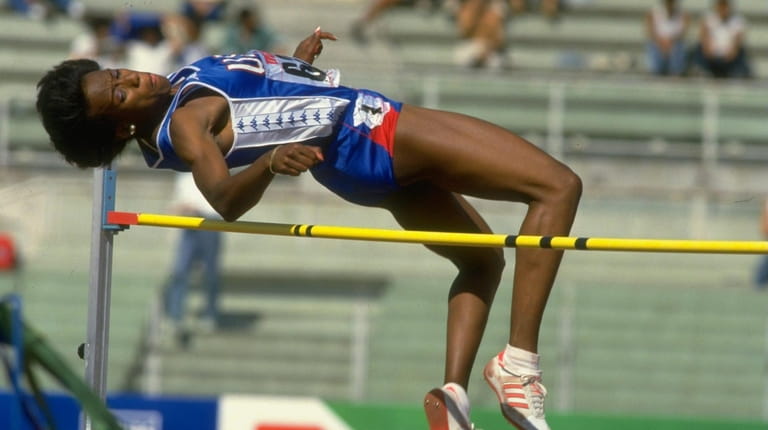 Jackie Joyner-Kersee of the USA clears the bar in the...