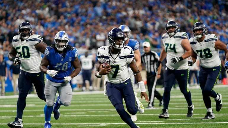 Seattle Seahawks quarterback Geno Smith (7) scrambles up field during...