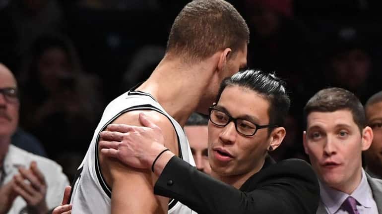 Brooklyn Nets center Brook Lopez and Nets guard Jeremy Lin,...