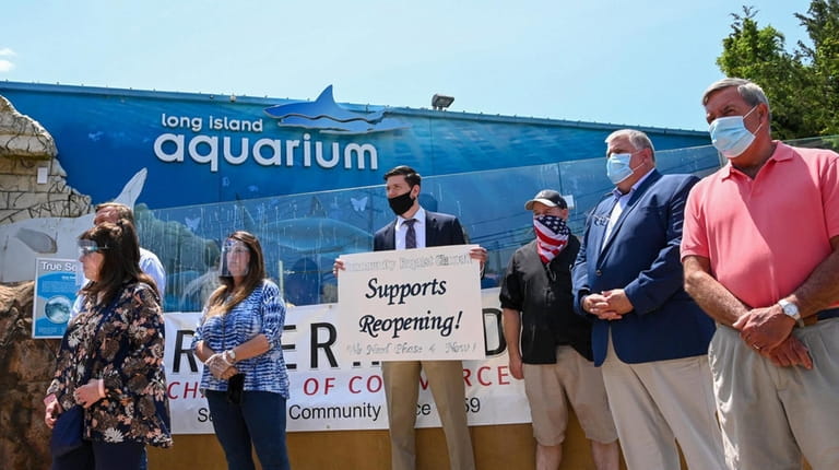 Business owners speaking at the Long Island Aquarium in Riverhead...