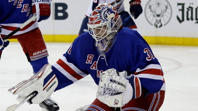Igor Shesterkin of the Rangers makes a save during the second period...