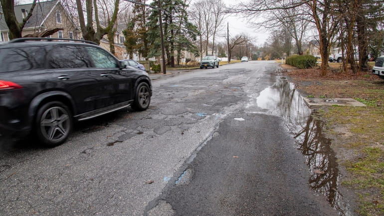 Altamore Street in Melville, which hasn't been repaved since the 1990s, according...