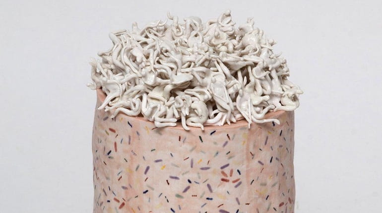 Monica Banks' "Hymn," a glazed English porcelain sculpture, is one...