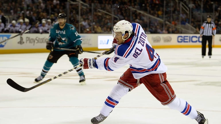 Michael Del Zotto of the Rangers shoots on goal during...