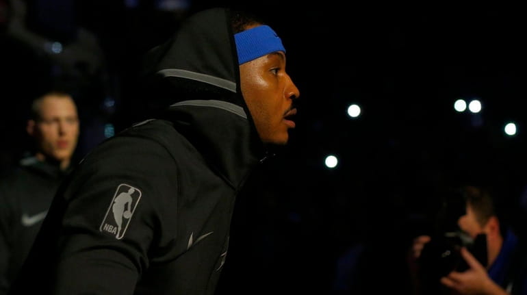 Thunder forward Carmelo Anthony is introduced before a game against...