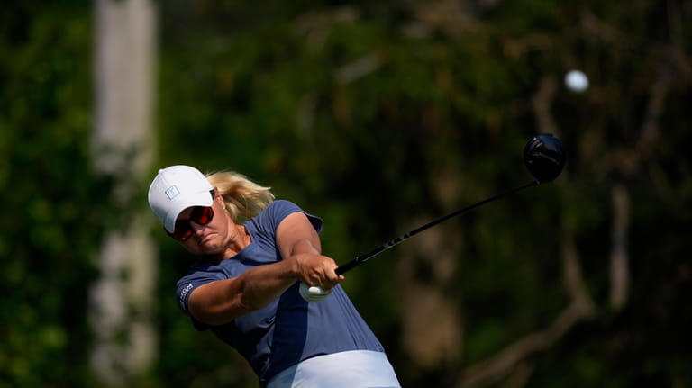 Anna Nordqvist, of Sweden, tees off on the 14th hole...