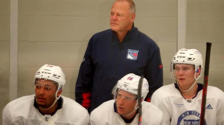 Rangers head coach Gerard Gallant watches from the bench during...