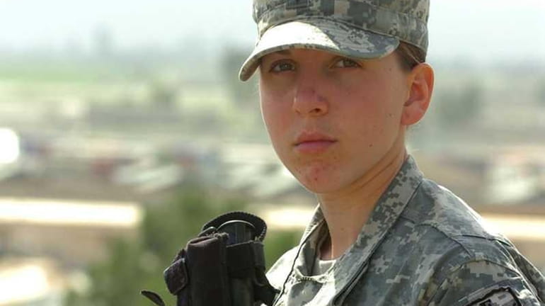 Army Spc. Monica Brown, a medic from the 82nd Airborne...