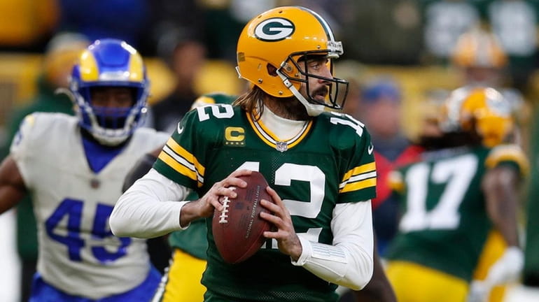 Packers quarterback Aaron Rodgers throws a pass during an NFL...