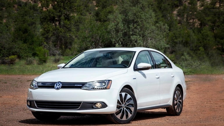 The 2013 Jetta Hybrid's stylings speak to the future, and...