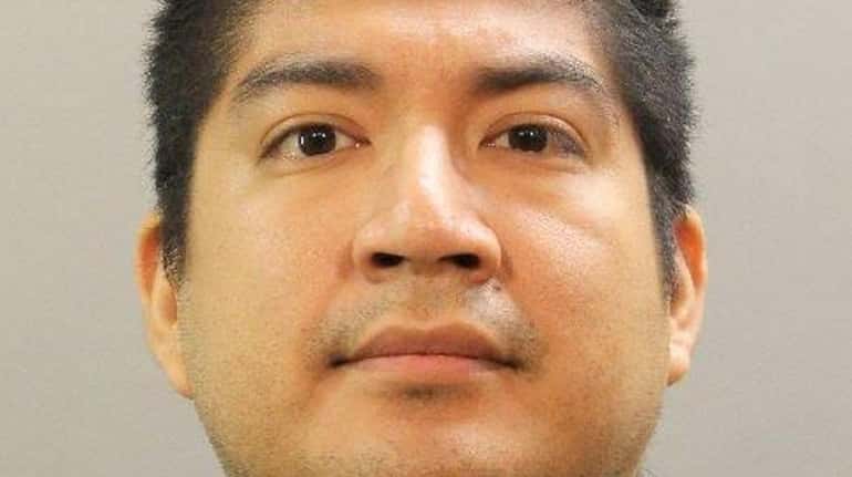 Bonifacio Enriquez, 35, of College Point, pleaded not guilty Tuesday...
