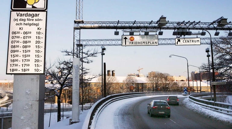 Cameras and sensors monitor traffic for the anti-congestion tolls that...