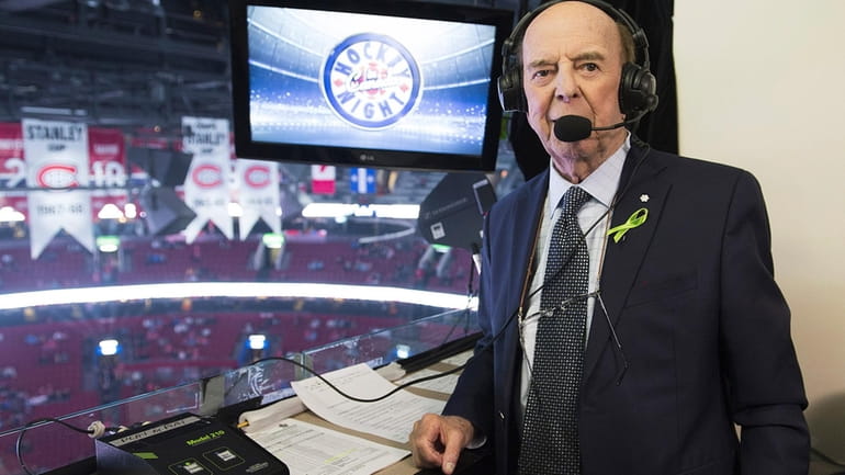 Broadcaster Bob Cole poses prior to calling his last NHL...