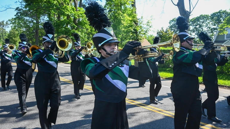Brentwood High School marching band marches in the Memorial Day...