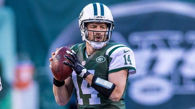 New York Jets quarterback Ryan Fitzpatrick (14) throws during the...